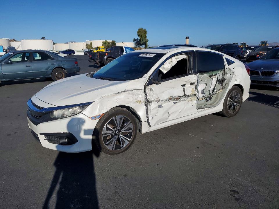 Снимка 1 от търг – 2016 HONDA CIVIC с VIN 2HGFC1F33GH656726