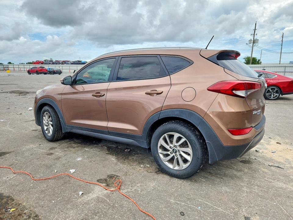 Photo 2 from auction – 2016 HYUNDAI TUCSON with VIN KM8J33A22GU076704