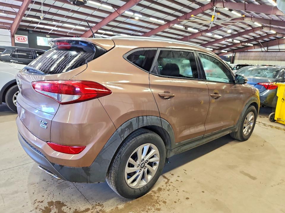 Photo 3 from auction – 2016 HYUNDAI TUCSON with VIN KM8J3CA20GU052059