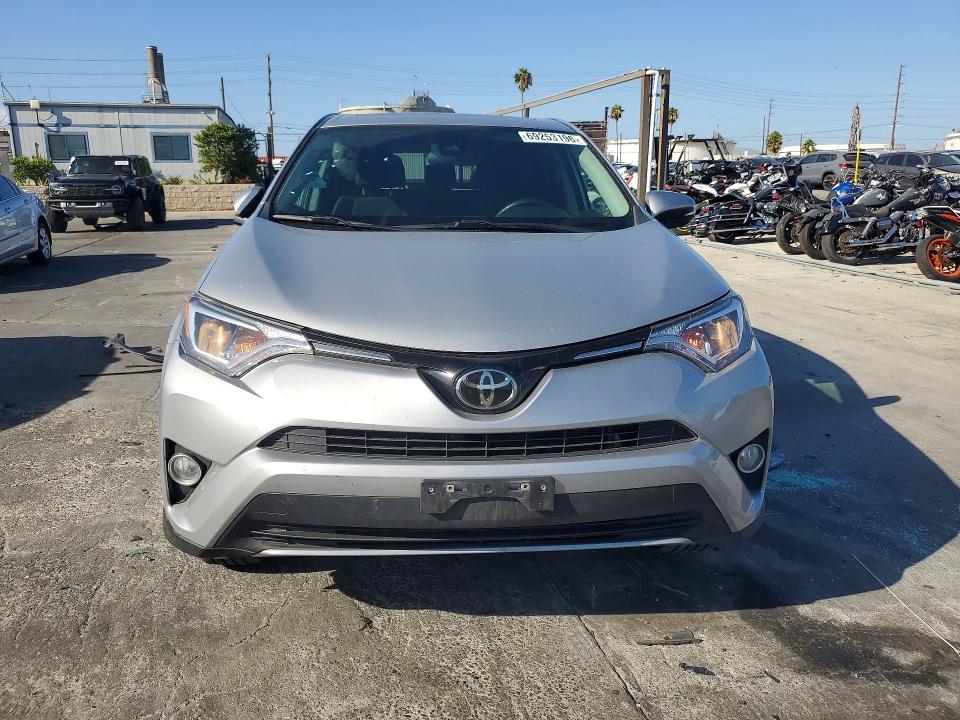 Photo 5 from auction – 2018 TOYOTA RAV4 with VIN 2T3WFREV3JW513614