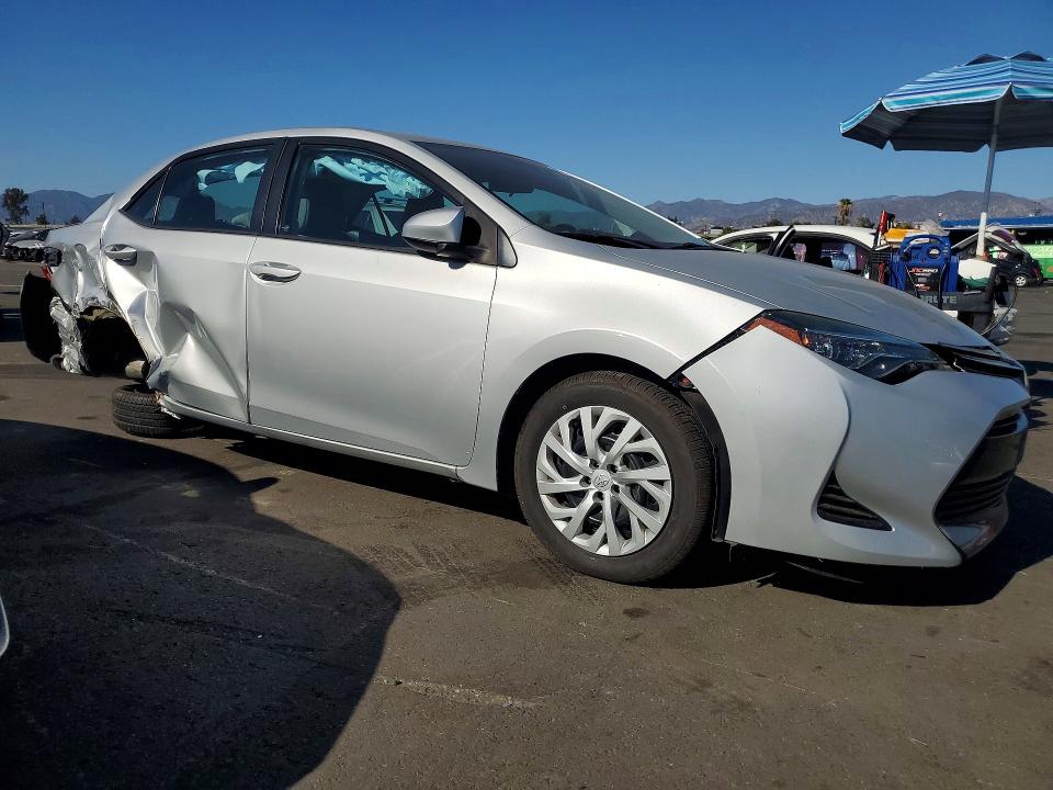 Photo 4 from auction – 2017 TOYOTA COROLLA with VIN 5YFBURHE7HP677324