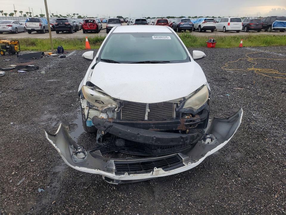 Photo 5 from auction – 2014 TOYOTA COROLLA with VIN 2T1BURHE3EC009189