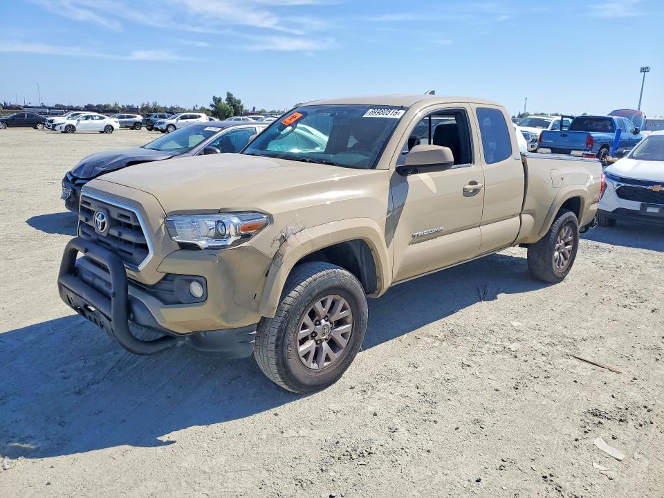 TOYOTA TACOMA 2016 с VIN 5TFSZ5AN5GX028836 - Снимка от търг