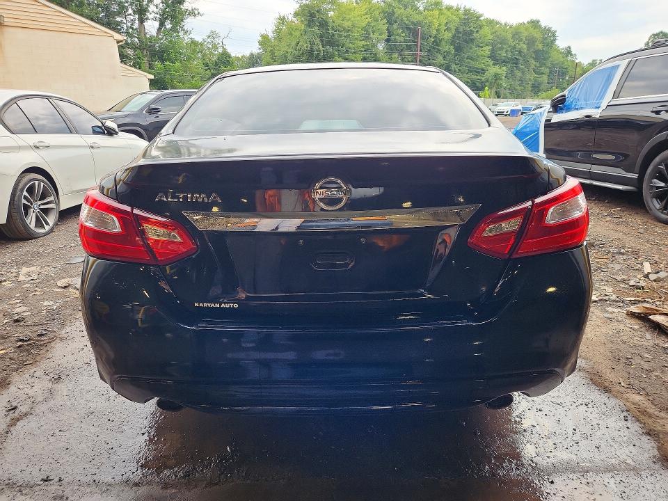 Photo 6 from auction – 2016 NISSAN ALTIMA with VIN 1N4AL3AP1GC180158