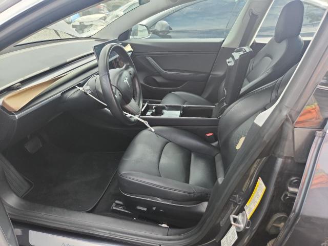 Photo 7 from auction – 2018 TESLA MODEL 3 with VIN 5YJ3E1EB4JF128551