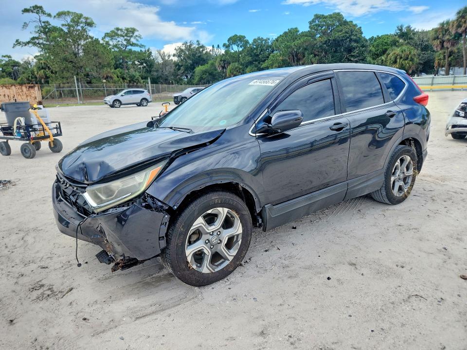 HONDA CR-V 2017 with VIN 7FARW1H83HE010366 - Photo from auction
