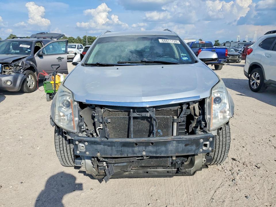 Photo 5 from auction – 2015 CADILLAC SRX with VIN 3GYFNBE31FS509097