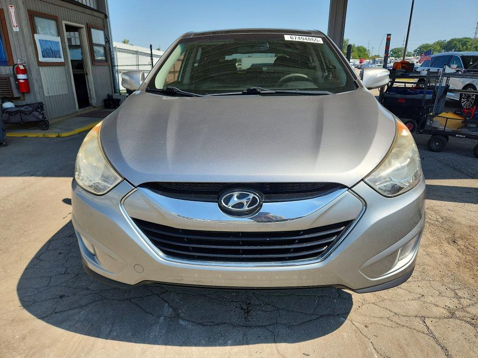 Photo 5 from auction – 2013 HYUNDAI TUCSON with VIN KM8JU3AC3DU564190