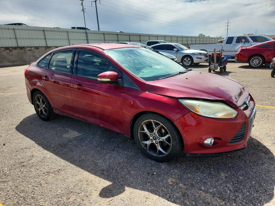 Photo 4 from auction – 2014 FORD FOCUS with VIN 1FADP3F22EL110339