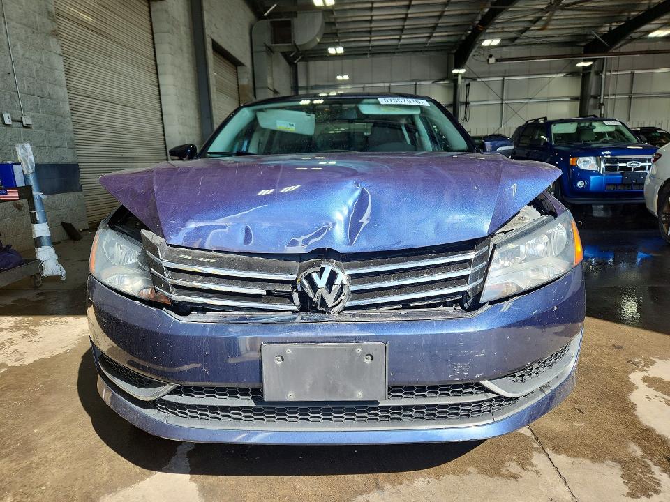 Photo 5 from auction – 2015 VOLKSWAGEN PASSAT with VIN 1VWAT7A31FC050259