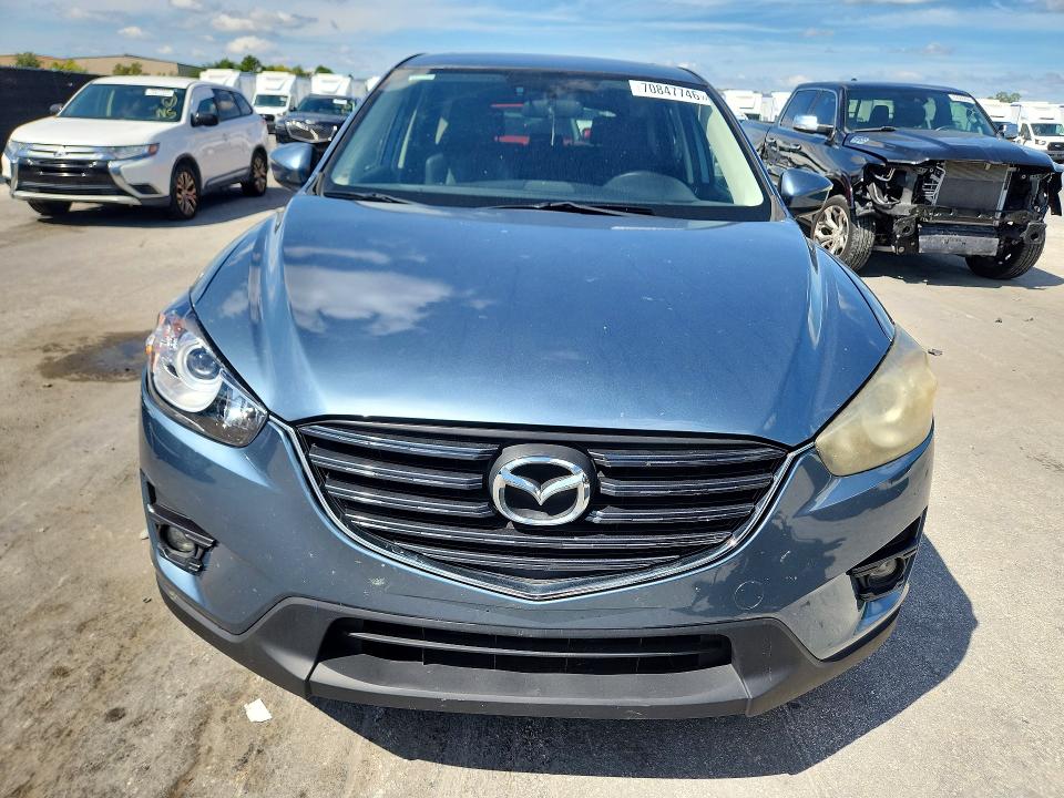 Photo 5 from auction – 2016 MAZDA CX-5 with VIN JM3KE4DYXG0607445