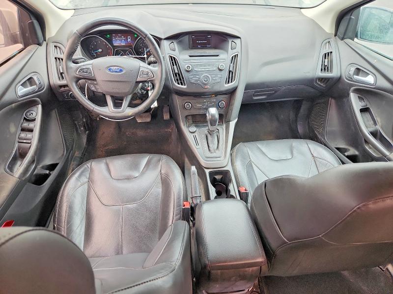 Foto 8 de la subasta – 2015 FORD FOCUS con VIN 1FADP3F25FL287212