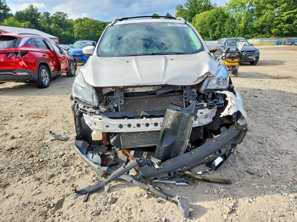 Снимка 5 от търг – 2014 FORD ESCAPE с VIN 1FMCU9J93EUB36220