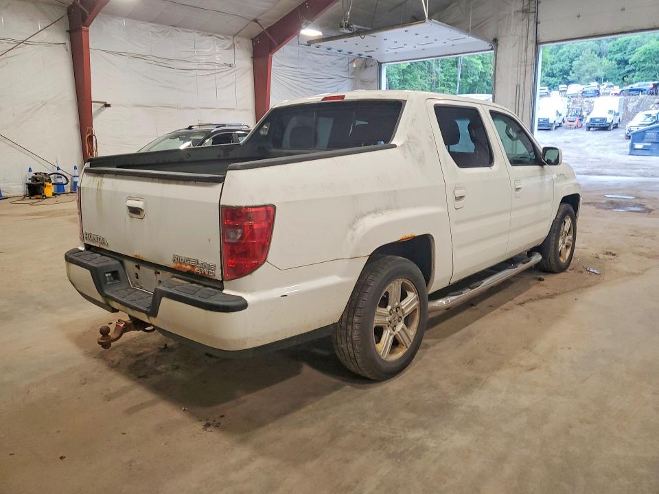 Photo 3 from auction – 2010 HONDA RIDGELINE with VIN 5FPYK1F59AB012521