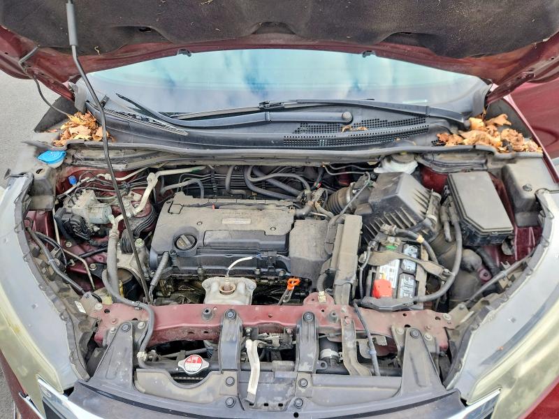 Photo 11 from auction – 2016 HONDA CR-V with VIN 2HKRM3H51GH553881
