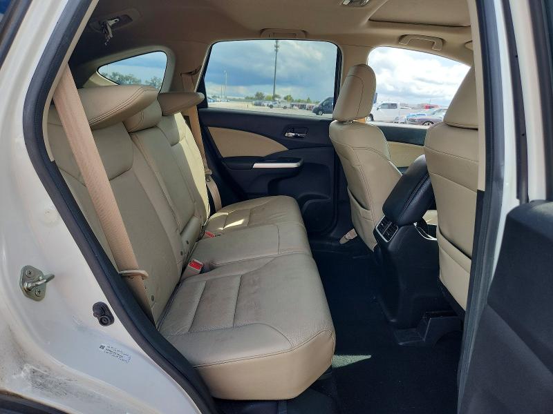 Photo 11 from auction – 2015 HONDA CR-V with VIN 5J6RM4H79FL030409