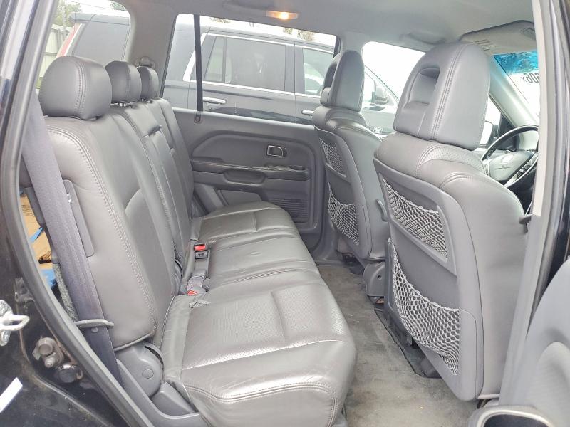 Photo 11 from auction – 2004 HONDA PILOT with VIN 2HKYF18544H570051