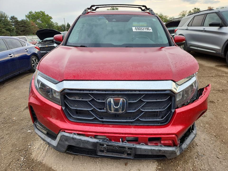 Photo 5 from auction – 2022 HONDA RIDGELINE with VIN 5FPYK3F73NB012632