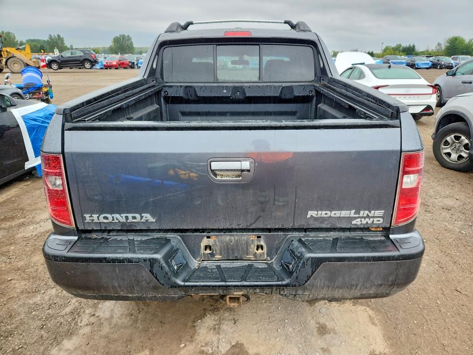 Photo 6 from auction – 2010 HONDA RIDGELINE with VIN 5FPYK1F58AB503498
