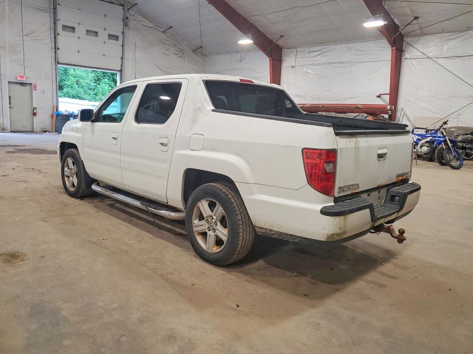 Photo 2 from auction – 2010 HONDA RIDGELINE with VIN 5FPYK1F59AB012521