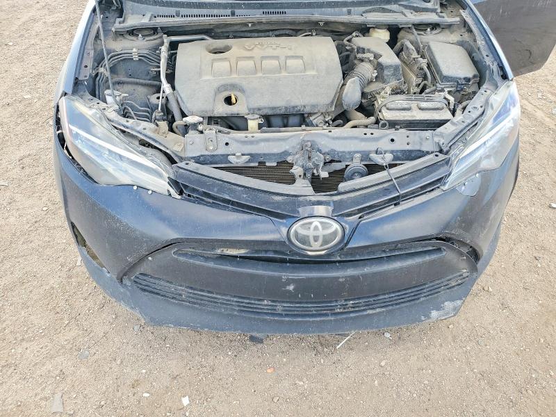 Снимка 11 от търг – 2018 TOYOTA COROLLA с VIN 5YFBURHE4JP833440