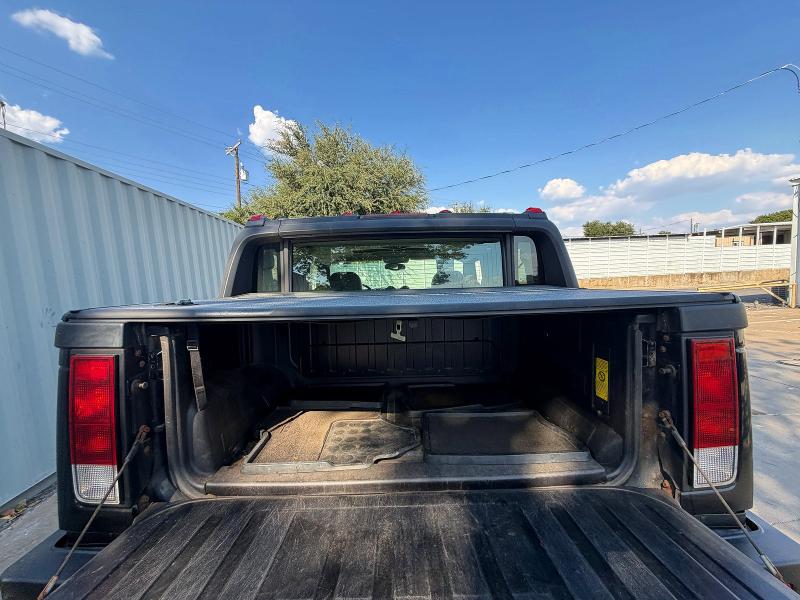 Photo 13 from auction – 2006 HUMMER H2 SUT with VIN 5GRGN22U76H121807