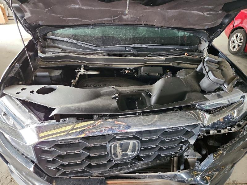 Снимка 12 от търг – 2022 HONDA PASSPORT с VIN 5FNYF8H5XNB028266