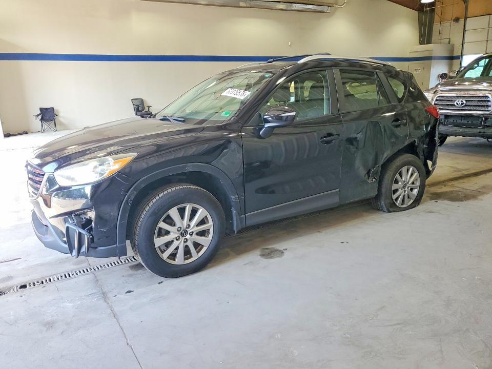 MAZDA CX-5 2016 with VIN JM3KE2BE0G0635638 - Photo from auction