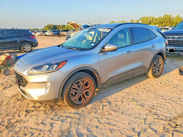 FORD ESCAPE 2021 with VIN 1FMCU9H67MUA64500 - Photo from auction