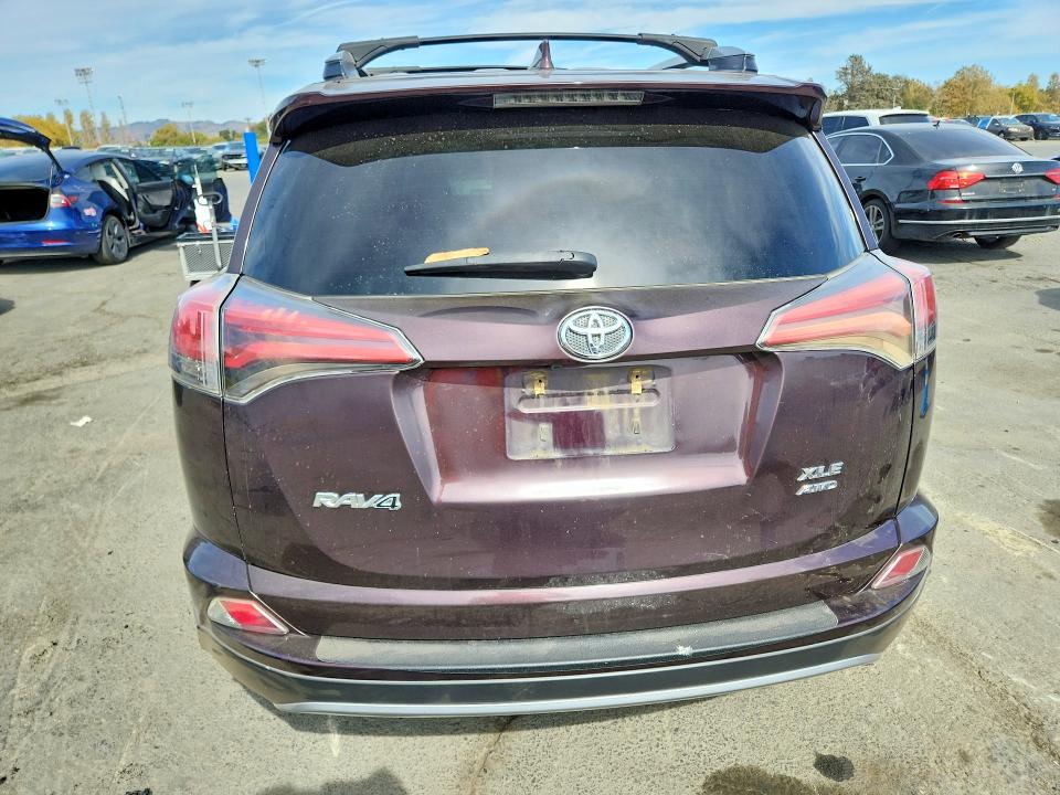 Photo 6 from auction – 2017 TOYOTA RAV4 with VIN 2T3RFREV9HW582511