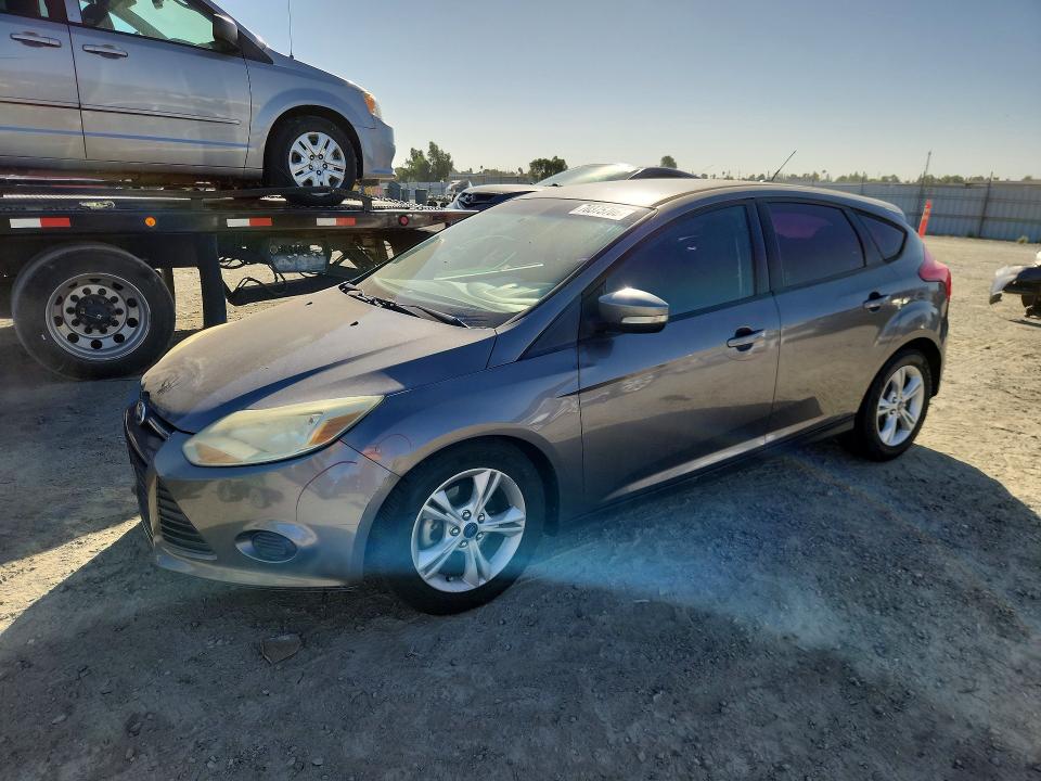 FORD FOCUS 2014 with VIN 1FADP3K2XEL407817 - Photo from auction
