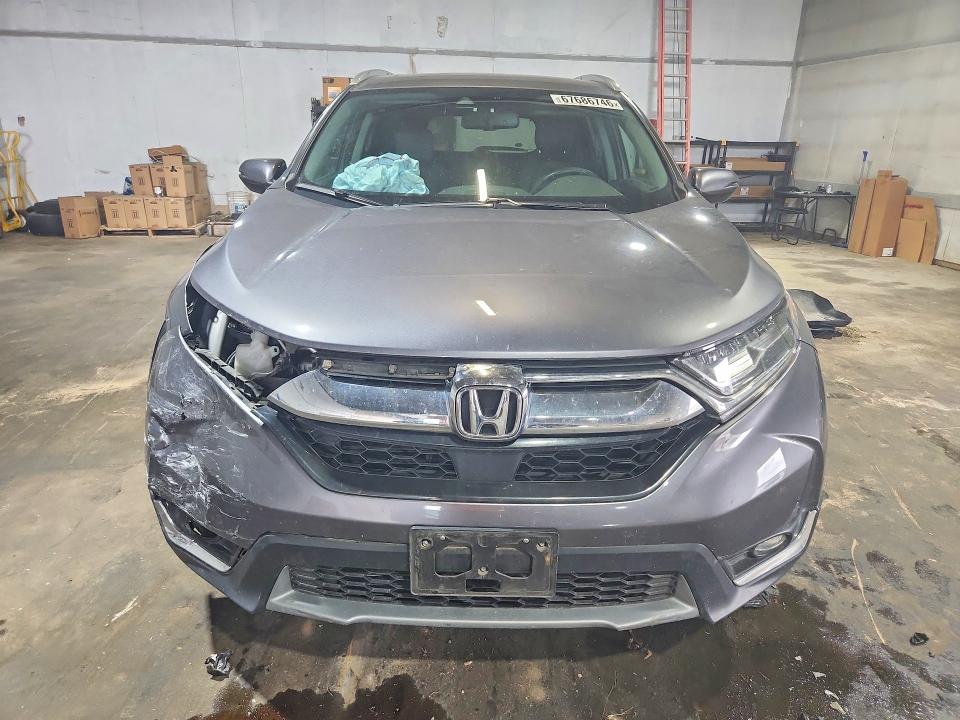 Photo 5 from auction – 2019 HONDA CR-V with VIN 7FARW2H90KE016860