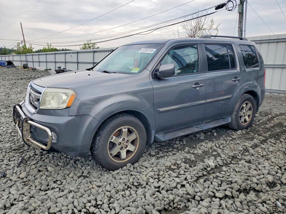 HONDA PILOT 2011 with VIN 5FNYF4H93BB064968 - Photo from auction