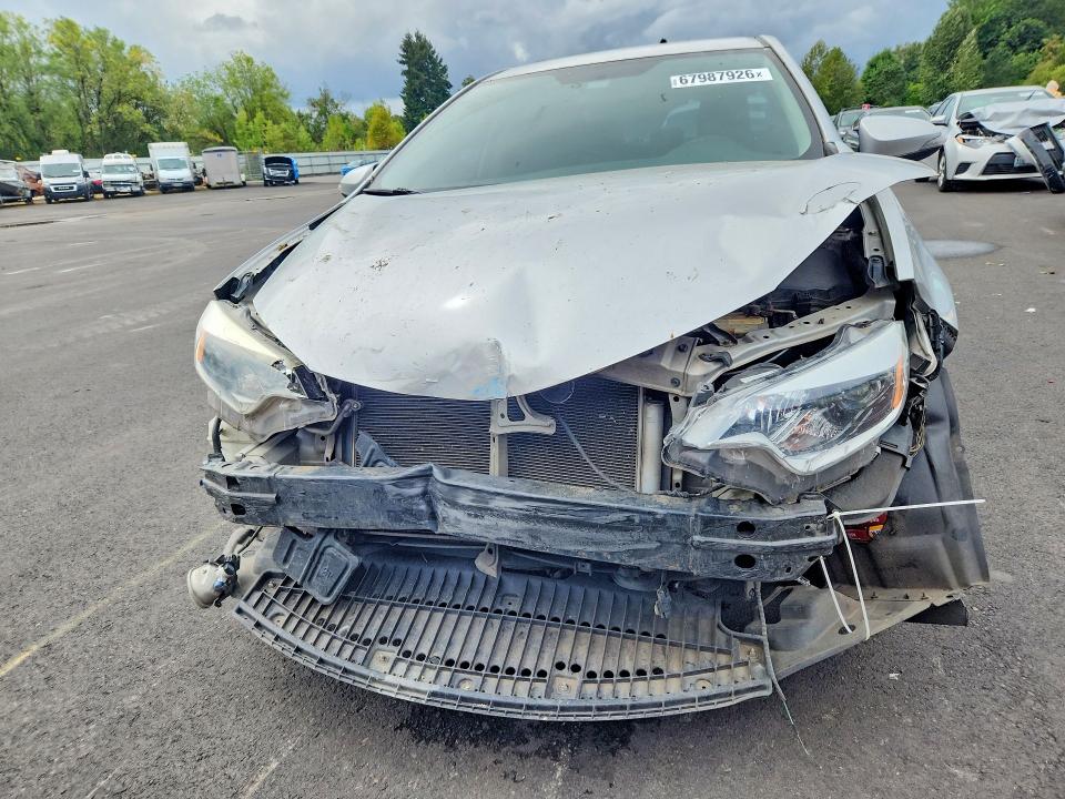 Photo 5 from auction – 2015 TOYOTA COROLLA with VIN 5YFBURHE4FP286418