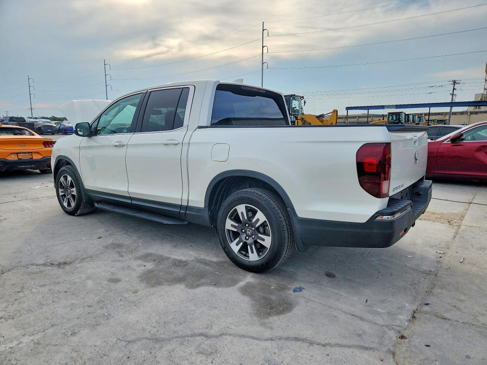 Photo 2 from auction – 2018 HONDA RIDGELINE with VIN 5FPYK2F63JB003196
