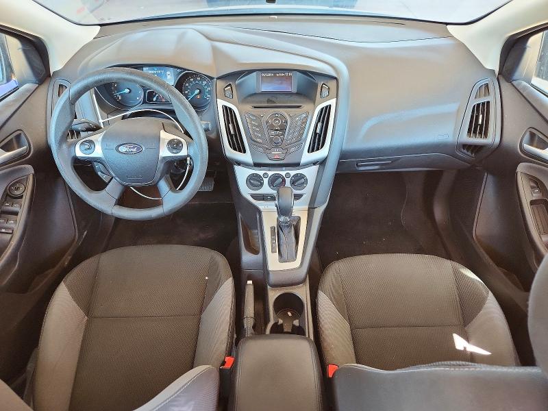 Photo 8 from auction – 2014 FORD FOCUS with VIN 1FADP3F2XEL129592