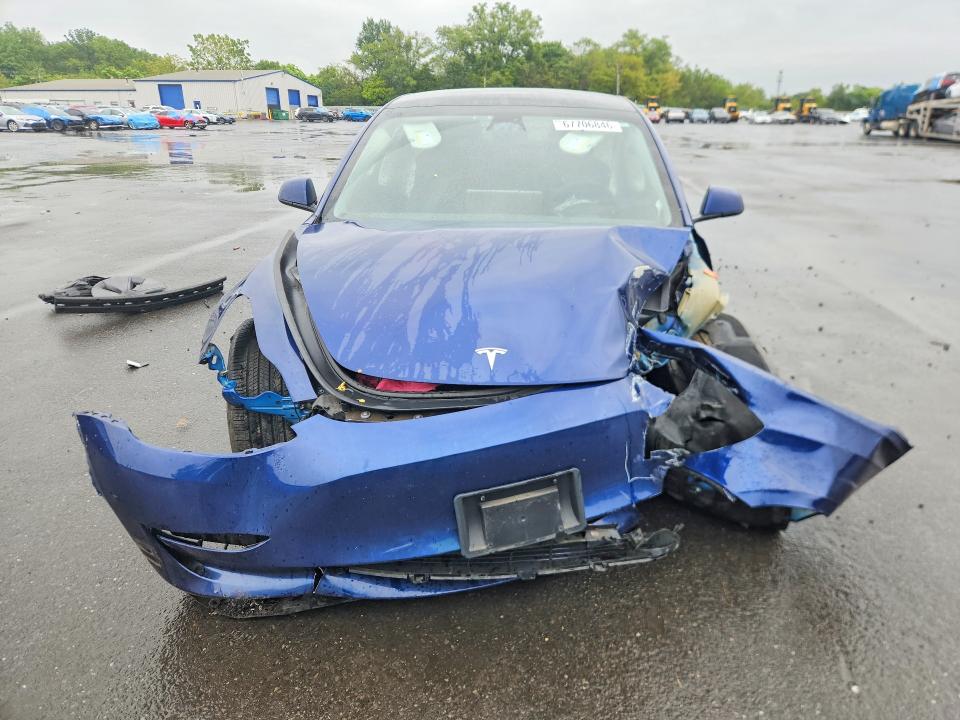 Снимка 5 от търг – 2023 TESLA MODEL 3 с VIN 5YJ3E1EB8PF621609