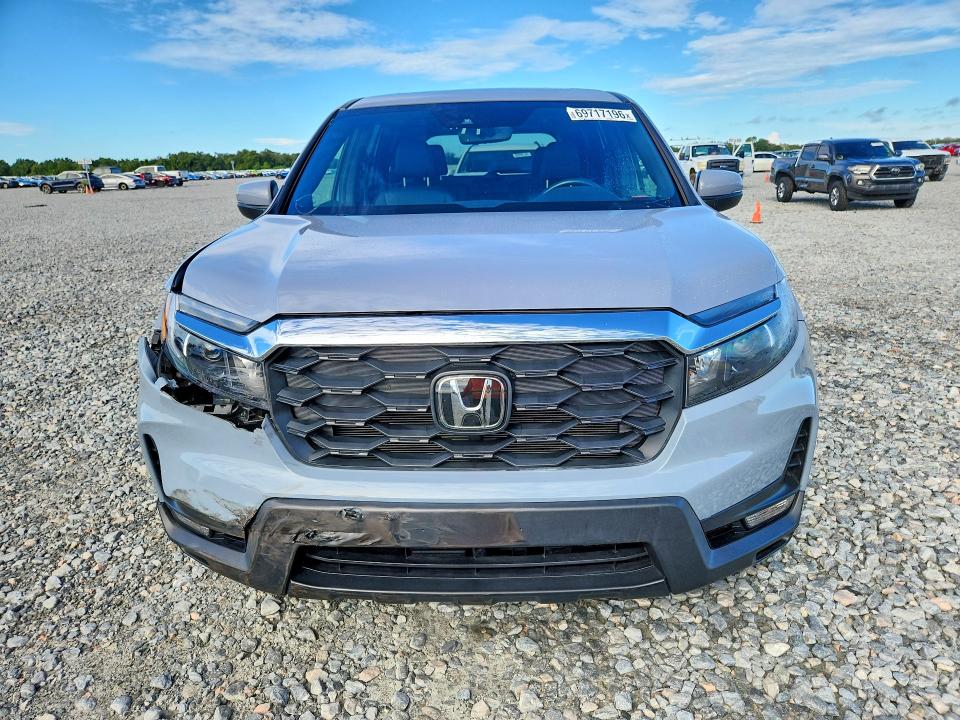 Photo 5 from auction – 2024 HONDA PASSPORT with VIN 5FNYF8H57RB020342