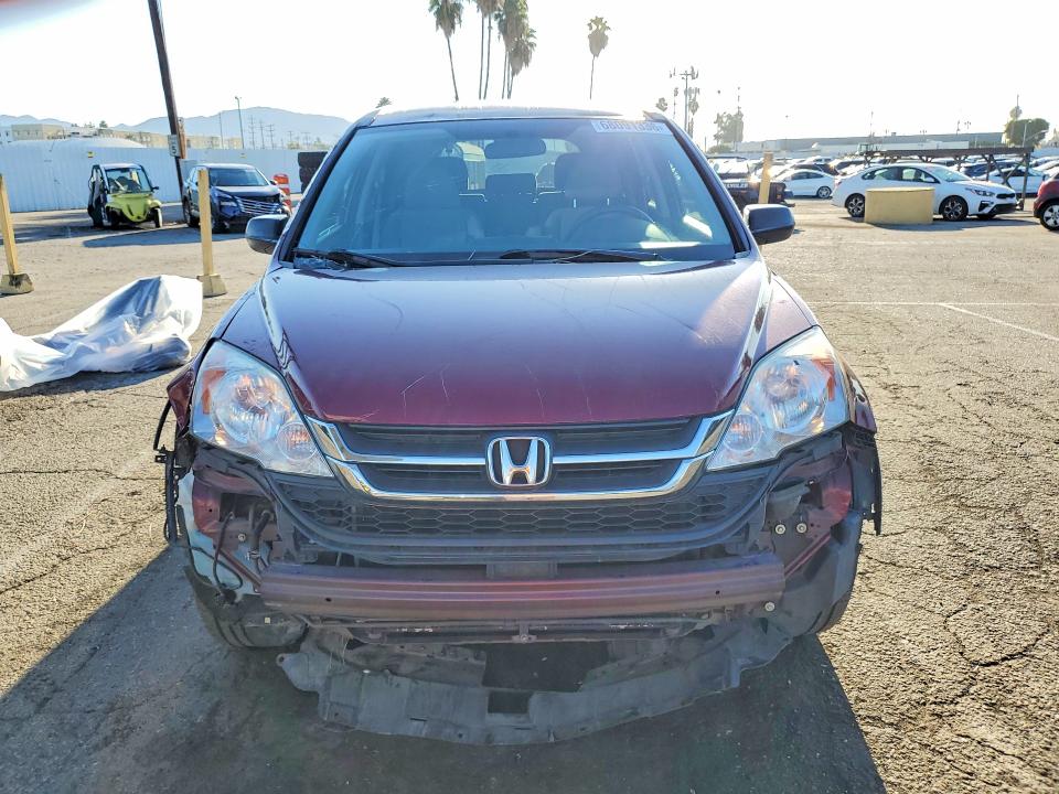 Photo 5 from auction – 2011 HONDA CR-V with VIN 5J6RE3H4XBL061398