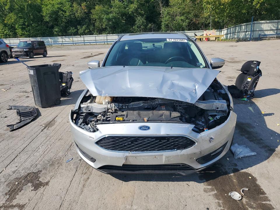 Photo 5 from auction – 2016 FORD FOCUS with VIN 1FADP3K21GL332802