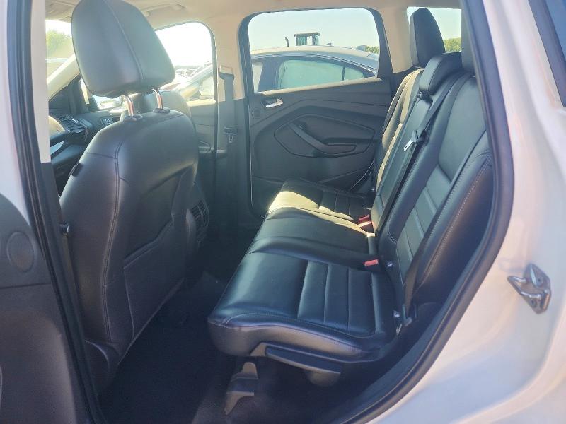 Photo 11 from auction – 2016 FORD ESCAPE with VIN 1FMCU9JX4GUC04669