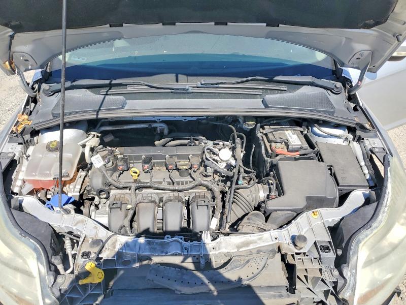Снимка 11 от търг – 2014 FORD FOCUS с VIN 1FADP3F25EL327500