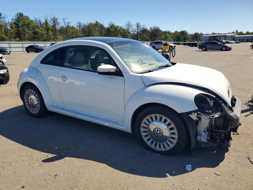 Photo 4 from auction – 2015 VOLKSWAGEN BEETLE with VIN 3VWJ17AT7FM641829