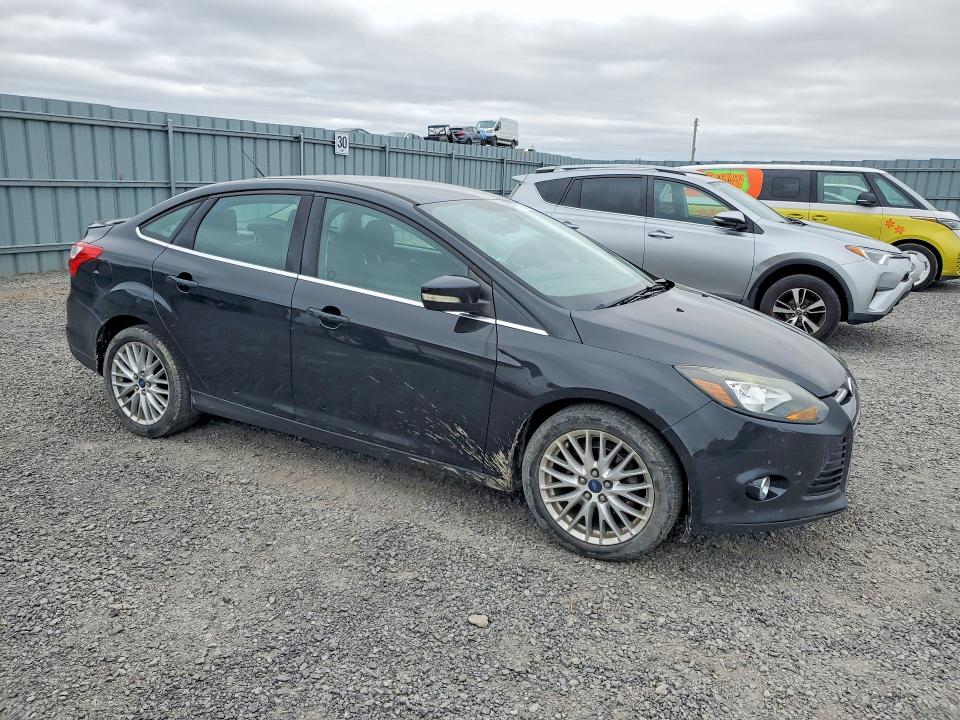Снимка 4 от търг – 2013 FORD FOCUS с VIN 1FADP3J26DL365355