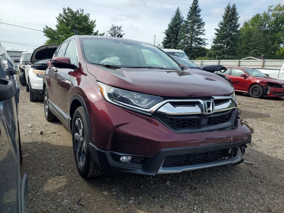Photo 4 from auction – 2018 HONDA CR-V with VIN 7FARW1H89JE053129
