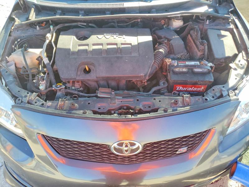 Снимка 11 от търг – 2009 TOYOTA COROLLA с VIN 1NXBU40E59Z112133