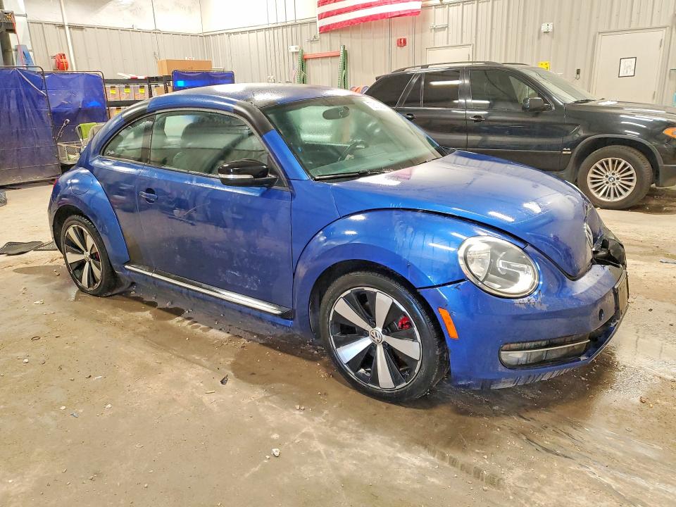 Photo 4 from auction – 2013 VOLKSWAGEN BEETLE with VIN 3VWVA7AT9DM626943