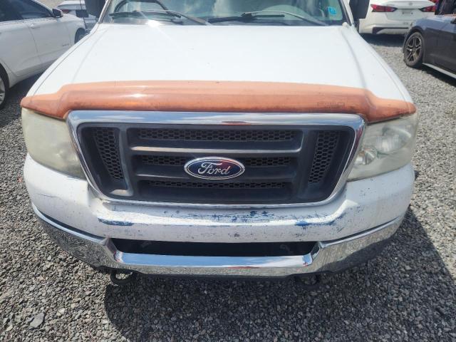 Photo 11 from auction – 2004 FORD F150 with VIN 1FTVX12564NC36645