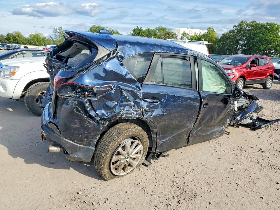 Photo 3 from auction – 2015 MAZDA CX-5 with VIN JM3KE4CY5F0472326