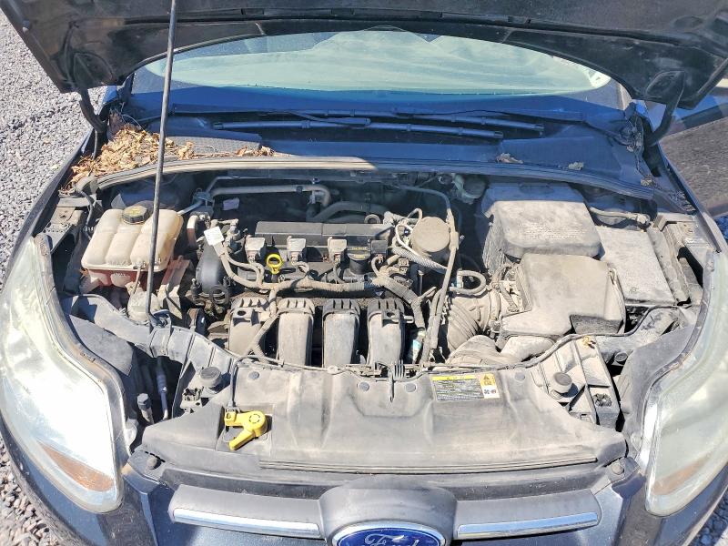 Photo 11 from auction – 2014 FORD FOCUS with VIN 1FADP3F23EL130793